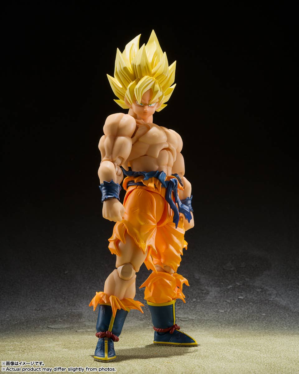 Action figure in Super Saiyan Gold and Blue outfit on a dark background