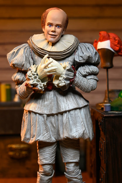 IT: Welcome to Derry - Ultimate Bob Gray as Pennywise 7-Inch Scale Action Figure